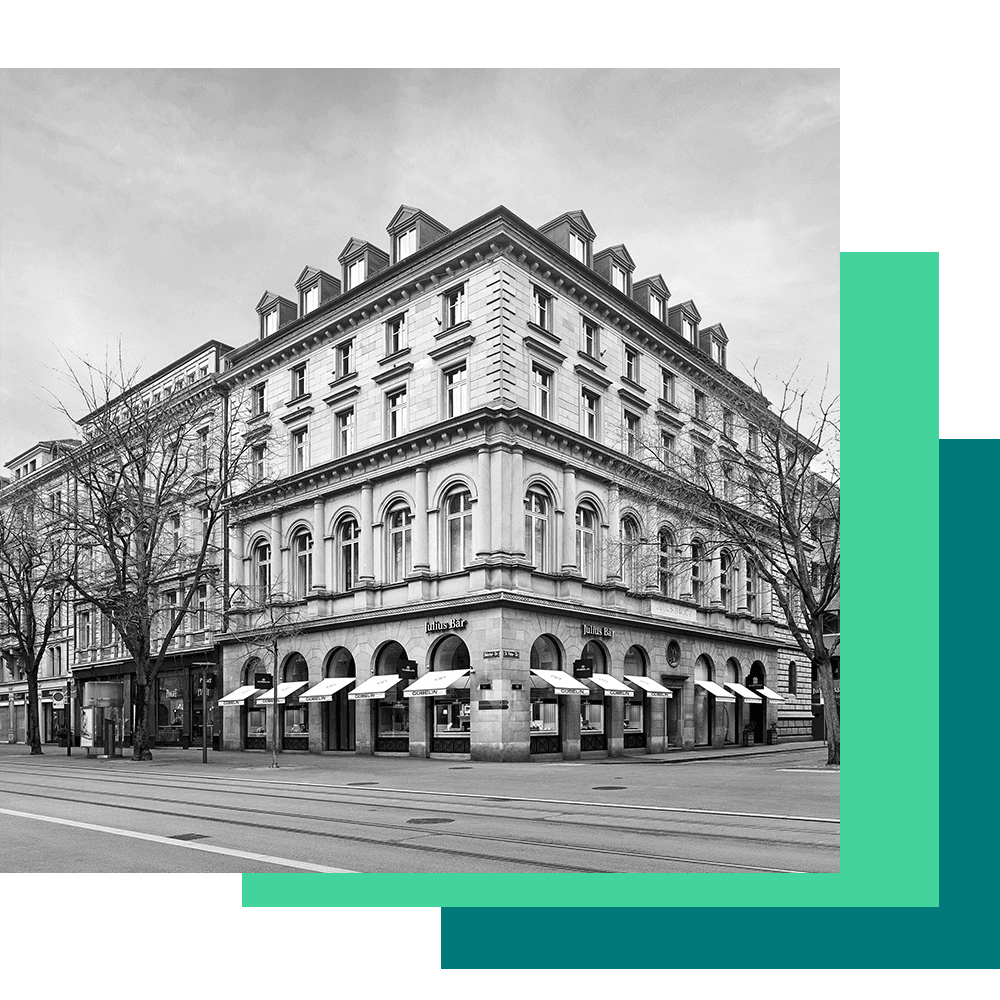 Image en noir et blanc d'un magasin Julius Baer avec vue sur la rue