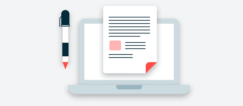 Laptop mit Artikel und Stift